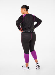 Base layer bottoms with contrast details, Black w. Charisma, Model