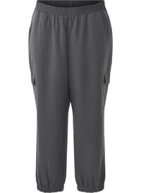 Trousers with cargo pockets and elasticated waist