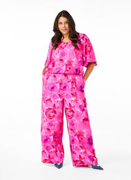 Floral jumpsuit with batwing sleeves, Pink Rose AOP, Model