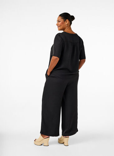 Zizzifashion Loose trousers with elasticated waistband and pockets, Black, Model image number 1