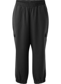 Trousers with cargo pockets and elasticated waist