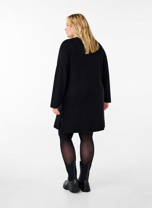 Zizzifashion Knitted dress with a round neck and slit, Black Solid, Model image number 1