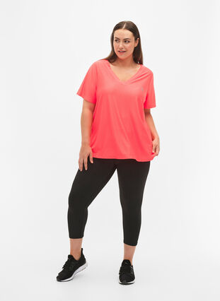 Zizzifashion Training t-shirt with v-neck and pattern, Fyring Coral ASS, Model image number 2